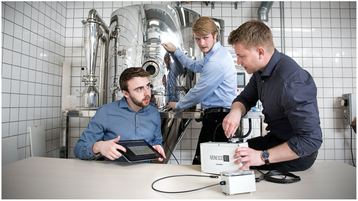 Figure 3: Engineers from Consibio demonstrating their IIoT platform, Monesco.
